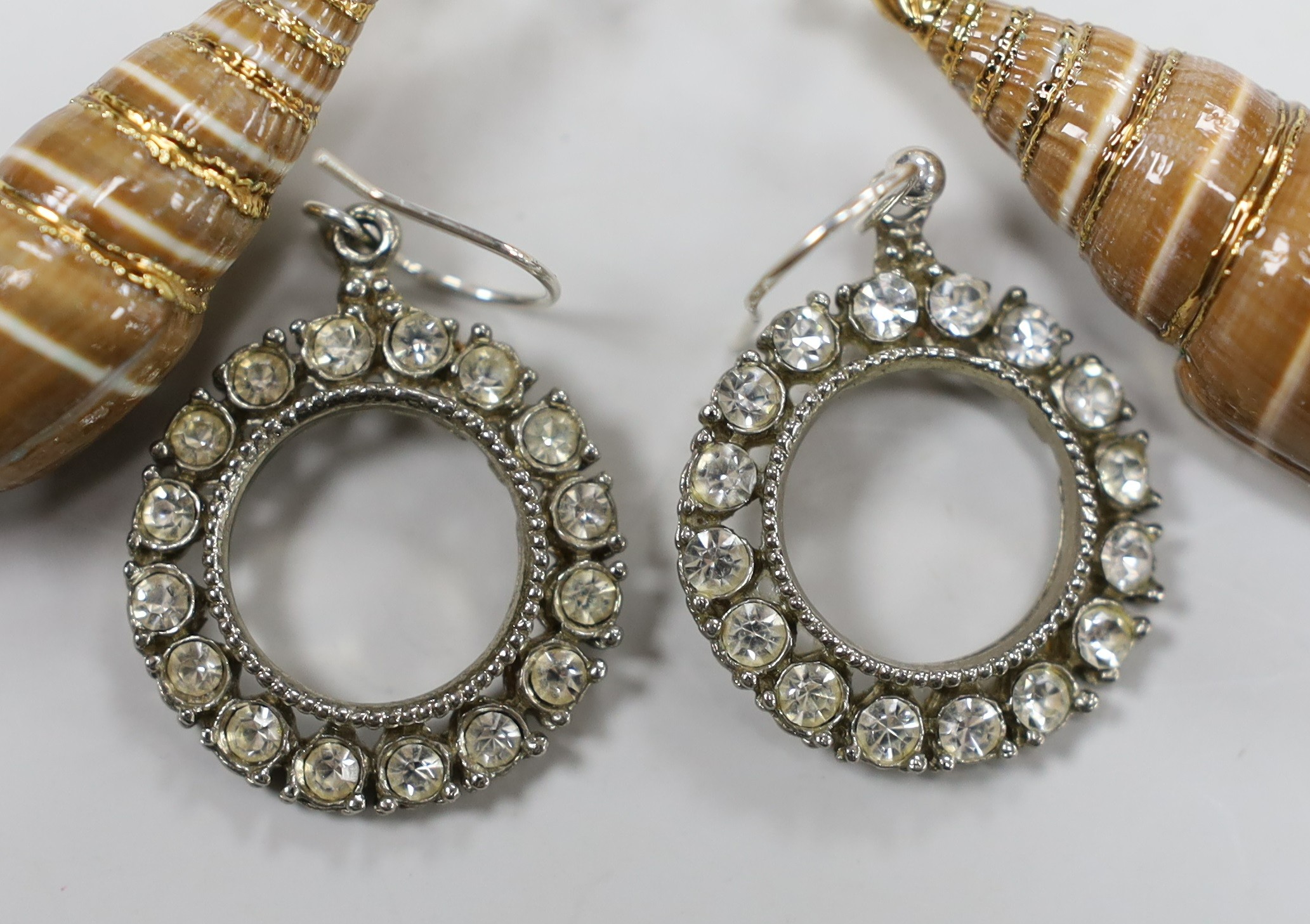 Two pairs of earrings, including paste set and mounted shell.